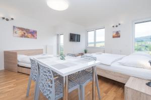 TV a/nebo společenská místnost v ubytování Horský apartmán Temari 12 Klínovec