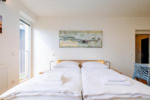 Postel nebo postele na pokoji v ubytování Horský apartmán Temari 12 Klínovec