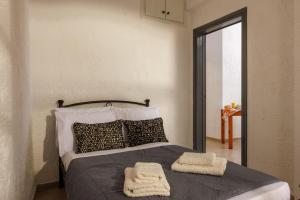 Postel nebo postele na pokoji v ubytování Kings Hersonissos Hotel