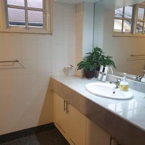 a bathroom with a sink and a mirror at 5 Twenty @ Ampang Hilir in Kuala Lumpur