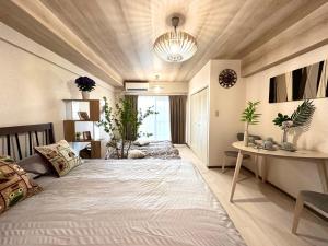 Giường trong phòng chung tại shibuya center -Max 5p-家庭公寓-车站7分-直达新宿涉谷六本木银座