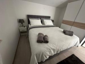 Posteľ alebo postele v izbe v ubytovaní Villa Lorenta Apartments