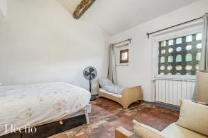 Rúm í herbergi á Parenthèse en Luberon