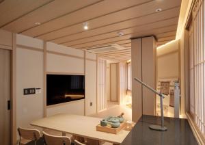 a dining room with a table and chairs at UH Suite Central Seoul in Seoul