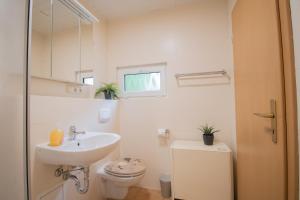 Koupelna v ubytování Tiny-Bungalow - zum Strand 50m