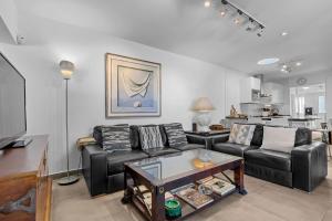 a living room with a couch and a table at Villa Patos in Playa Blanca