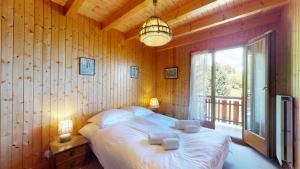 Postel nebo postele na pokoji v ubytování Family chalet in La Tzoumaz - 4 Valleys