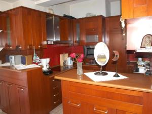 Kuchyň nebo kuchyňský kout v ubytování Amaryllis Apartment in Volos