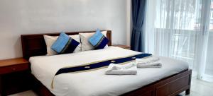 Postel nebo postele na pokoji v ubytování Chalita House