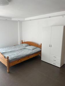 Postel nebo postele na pokoji v ubytování Apartament Dzierzecin