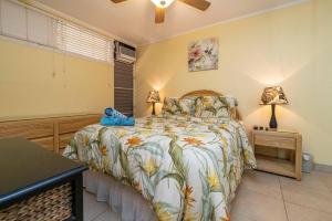 En eller flere senge i et værelse på Kuleana Resort 302 + 28 billeder