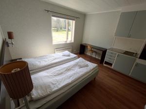 Postel nebo postele na pokoji v ubytování Äppelbo Gästgiveri
