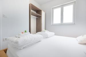 Postel nebo postele na pokoji v ubytování Apartment Ana