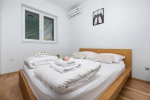 A bed or beds in a room at Apartment Ana