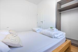Postel nebo postele na pokoji v ubytování Apartment Ana