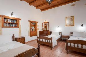 Postel nebo postele na pokoji v ubytování Villa Anastasia Kalyves + 16 fotografií