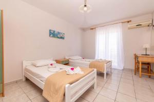 Posteľ alebo postele v izbe v ubytovaní Armonia Hotel by Zante Plaza
