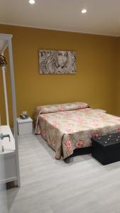 Postel nebo postele na pokoji v ubytování Casa Vacanza Tiffany