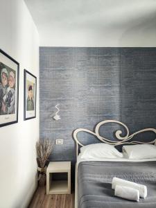 Кровать или кровати в номере Nashira Rooms