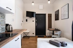 Kuchnia lub aneks kuchenny w obiekcie Dream Apartments - Gdańska 72