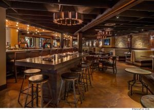 a bar in a restaurant with bar stools at Golden Nugget Lake Tahoe in Stateline +12 photos