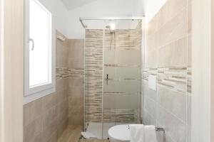 Koupelna v ubytování Sardegna è - New Rooms + 27 fotografií