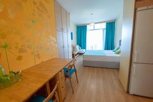 A bed or beds in a room at Beachfront Studio with Private Path to the Sea