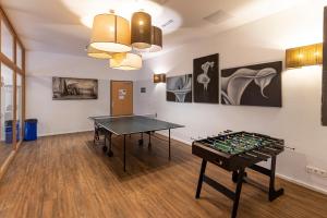 Herňa v ubytovaní Dormio Resort Obertraun + 24 fotografií