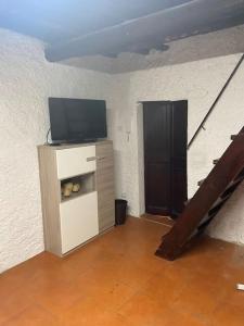 TV a/nebo společenská místnost v ubytování Casa Hope