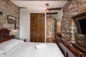 Posteľ alebo postele v izbe v ubytovaní Pool Villa Cupido - Happy Rentals