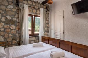 Posteľ alebo postele v izbe v ubytovaní Pool Villa Cupido - Happy Rentals