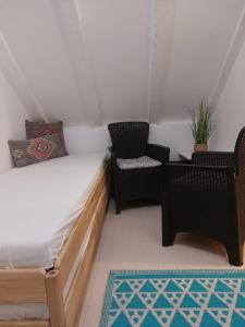 Postel nebo postele na pokoji v ubytování Apartment Stella