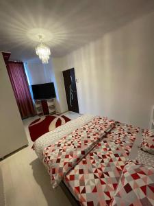 Postel nebo postele na pokoji v ubytování Zya Home Central + 2 fotografie