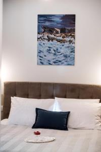 Łóżko lub łóżka w pokoju w obiekcie Avali Design Suites