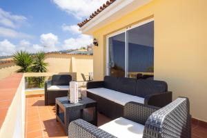 Posedenie v ubytovaní EDEN RENTALS Villa La Paz Ocean Views Heated Private Pool