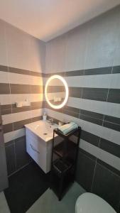 Ein Badezimmer in der Unterkunft Appartement paisible Haut FOUNTY