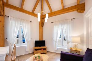 Telewizja i/lub zestaw kina domowego w obiekcie Avali Design Suites