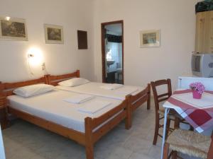 Postel nebo postele na pokoji v ubytování Panagiotis Apostoloudias Rooms