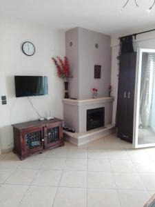 TV a/nebo společenská místnost v ubytování SOFI APARTMENT
