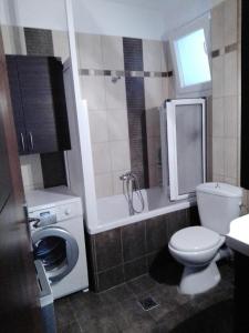 Koupelna v ubytování SOFI APARTMENT + 11 fotografií