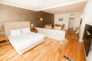 Postel nebo postele na pokoji v ubytování Vilamoura Garden Hotel