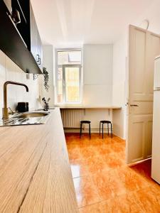 Kuchyň nebo kuchyňský kout v ubytování Villa 56*