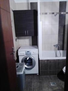 Koupelna v ubytování SOFI APARTMENT