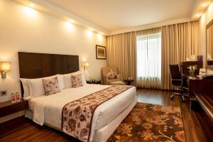 Postel nebo postele na pokoji v ubytování Four Points by Sheraton Jaipur, City Square