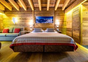 Voodi või voodid majutusasutuse Nendaz 4 Vallées & SPA 4* Superior toas
