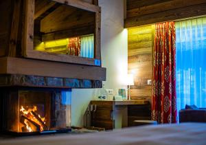 Voodi või voodid majutusasutuse Nendaz 4 Vallées & SPA 4* Superior toas