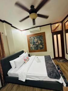 Postel nebo postele na pokoji v ubytování birdwatchers beachfront hotel panglao + 37 fotografií
