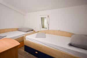 a room with two beds and a window at Relax House Kanica in Zaglavice +44 photos