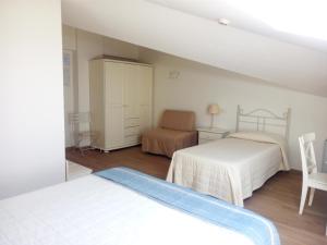 Postel nebo postele na pokoji v ubytování Hotel Giardino Suites&Spa