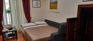 Ένα ή περισσότερα κρεβάτια σε δωμάτιο στο F&B Casa vacanze